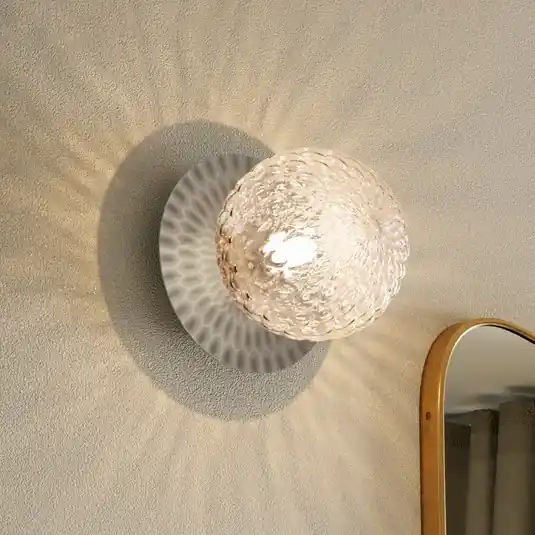 Nástěnné světlo Nuura Liila 1 Medium, stříbrné/čiré, IP44, G9 Akční Nabídka