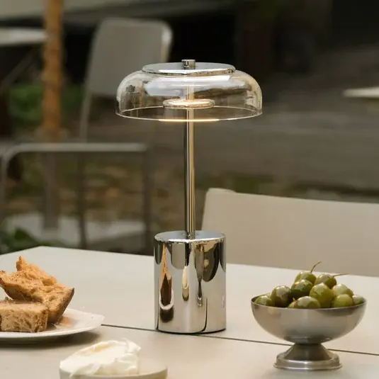 Ověřený Nuura LED stolní lampa na baterie Blossi, výška 26 cm, chrom/čirá