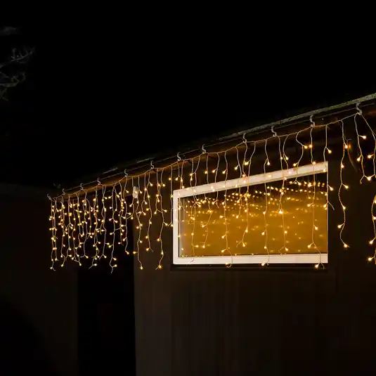 Must-Have LED světelná clona ledový déšť teplá bílá transp. 10m